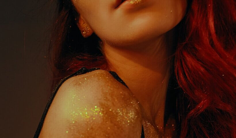 woman with glitters on her body